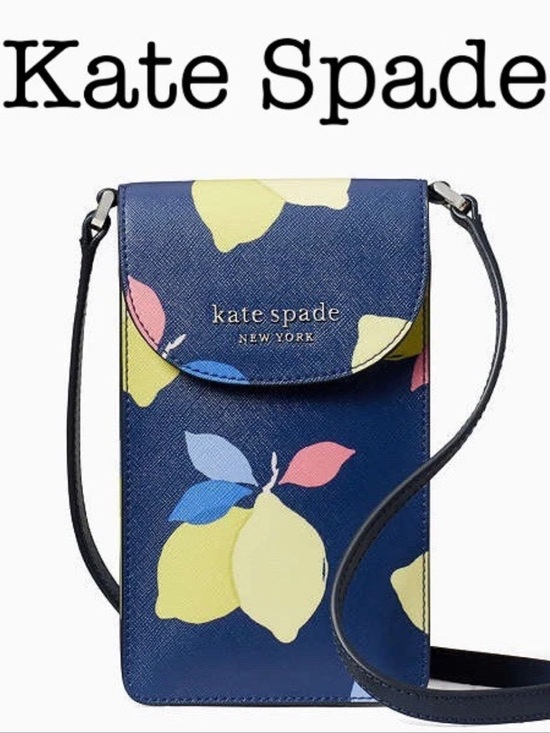kate spade Handbags - NWT Kate Spade Cameron Lemon Zest North South Flap Navy Phone Crossbody